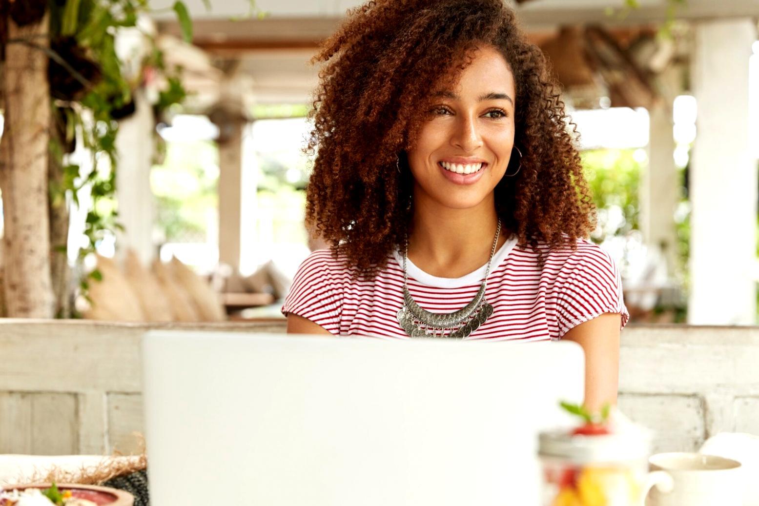 Modern web design workspace showing responsive layouts being developed across multiple devices